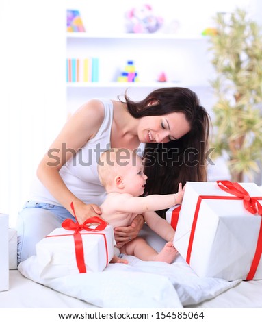 bright picture of happy child with gift box