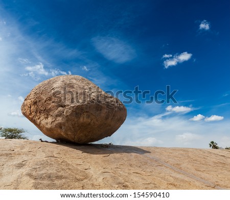 Krishna's butterball -  balancing giant natural rock stone. Mahabalipuram, Tamil Nadu, India Royalty-Free Stock Photo #154590410