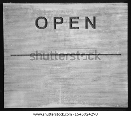 Open sign on a black background