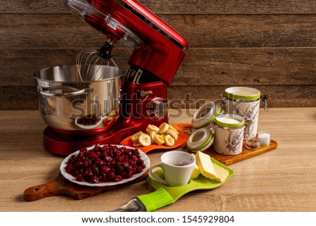 Center view of different ingredients and equipment for muffin making
