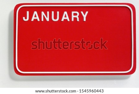 A picture of a car plate with the January calendar month	