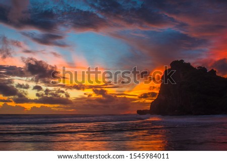 after sunset on the hidden beach Yogyakarta Indonesia