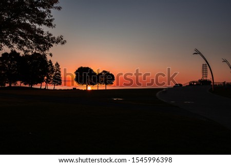 Fall Sunrise on Lake Ontario at Burlington, Ontario Royalty-Free Stock Photo #1545996398