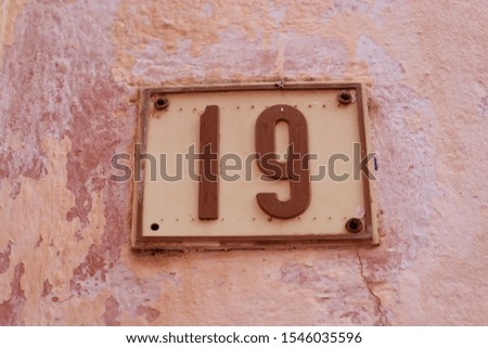 19 Numbers Sign On The Wall