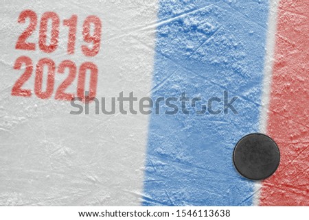 Fragment of a conceptual sports ice background and hockey accessory