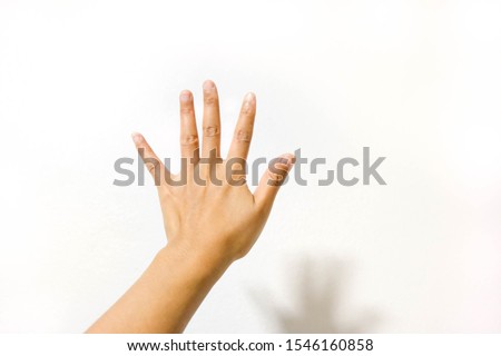 Woman hand showing the five fingers isolated on a white background. count - five , show five fingers. Gesture of woman hand count :five. Sign language. Hand Signals