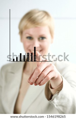 business woman looking at the graph growth of the company stock photo 