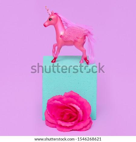 Unicorn toy in geometric space. Minimal art. Pink vibes