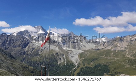 Beautiful view over Swiss Alps and glaciers in Val d'Hérens valley on a sunny Autumn day