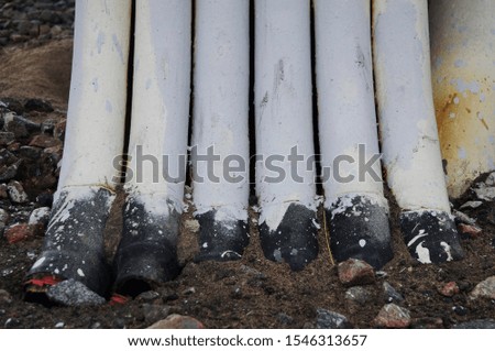 Photo of a background with white pipes
