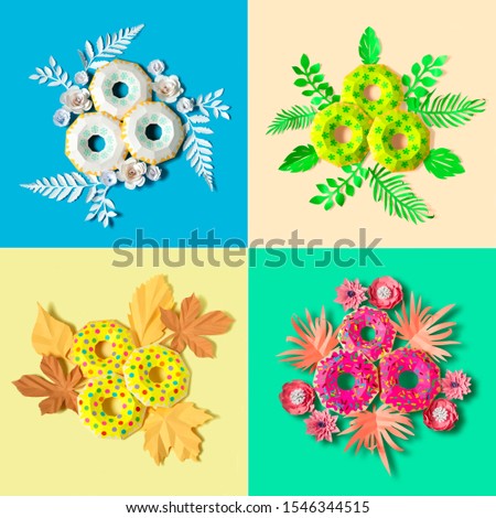 Set of paper donuts and leaves in seasonal design. Colorful collage of volumetric paper objects in winter, spring, summer and autumn design. Paper art and craft. Food art concept