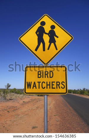 Bird watchers sign beside an outback road, Queensland, Australia