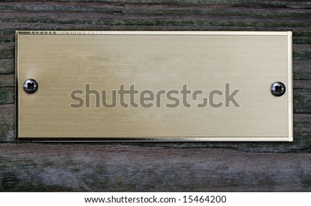 empty aged metal plate on wooden door Royalty-Free Stock Photo #15464200