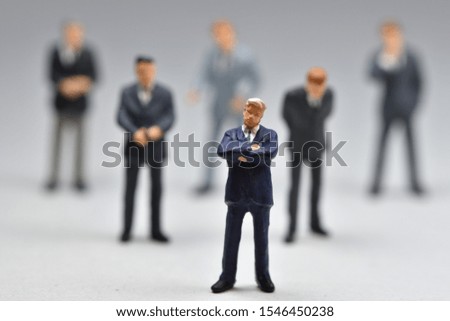 Miniature people business men are standing