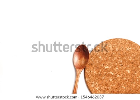 Flat lay of wooden spoon of plate cover. Isolated picture.