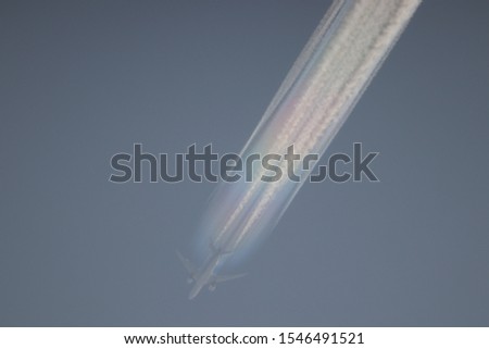 Contrail of the rainbow color