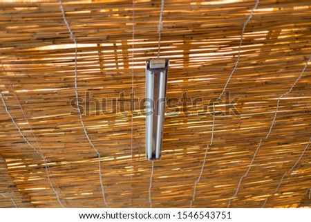 Reed background. Traditional bamboo reed fence on the ceiling. Asian style