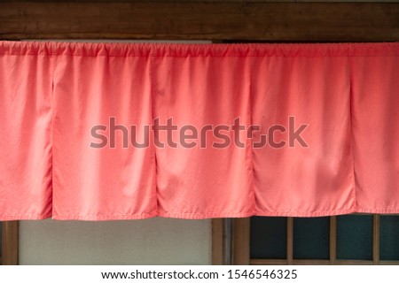 The curtain-like fabric that hangs in front of traditional Japanese restaurants and shops not only serves as a signboard, but holds a larger meaning,