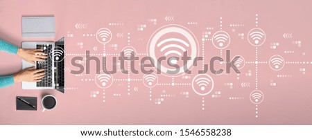 Wifi concept with person using a laptop