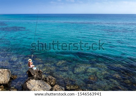 Greek fisherman at the sea