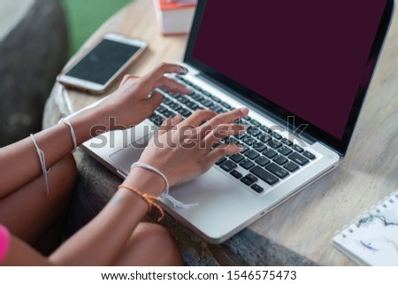 The girl hands typing on computer to study and search information