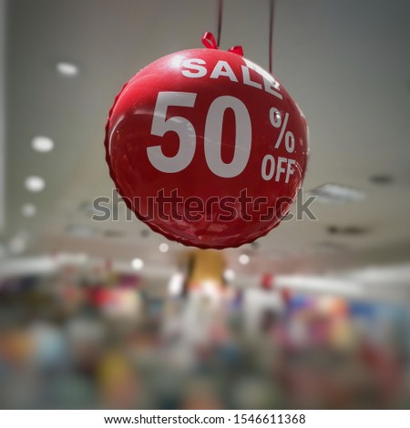  sale 50% off balloon display hanging from ceiling with drop lights bokeh and blurred colorful products for sale background 