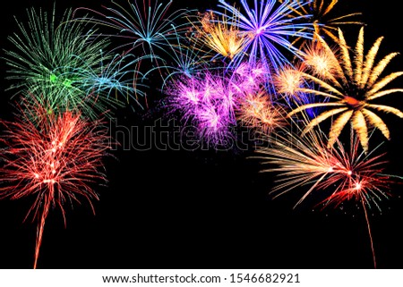 Colorful firework in front of dark background 