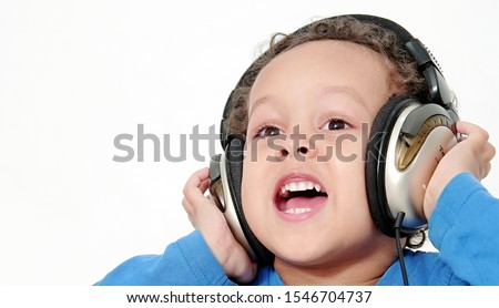 boy with headphones enjoying music   on white background stock photography stock photo