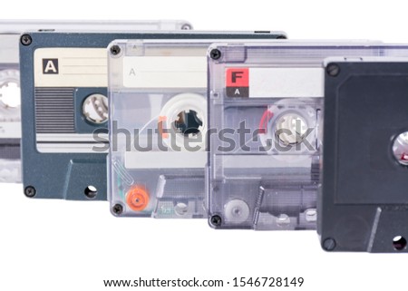 Old cassette tapes isolated on white background