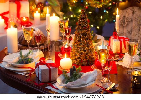 Traditionally decorated christmas table Royalty-Free Stock Photo #154676963
