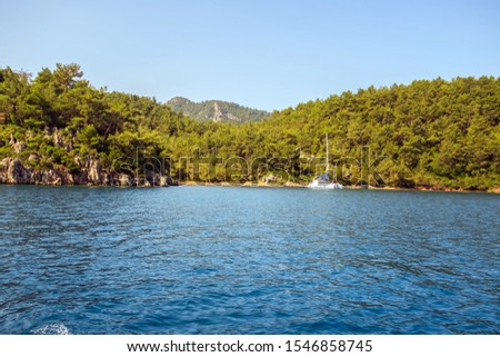 Beautiful Bay mountain valleys above wide open sea tropical island with white sand beach and blue clear water granite stones. forest background