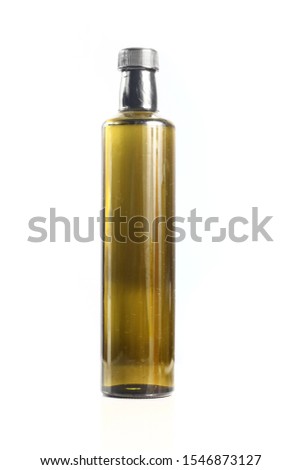 Isolated picture of cooking oil in luxury glass bottle. plant, animal, or synthetic fat used in frying, baking, and other types of cooking. 