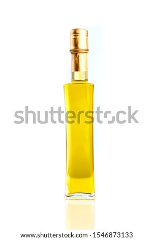 Isolated picture of cooking oil in luxury glass bottle. plant, animal, or synthetic fat used in frying, baking, and other types of cooking. 
