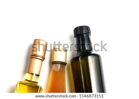 Variety of liquid in glass bottle. Isolated picture. Cooking oil in luxury design of glass bottle.
