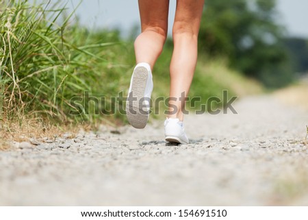 closeup photo of running shoes