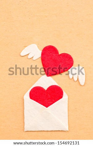 Stock Photo - love heart on Ancient paper  background