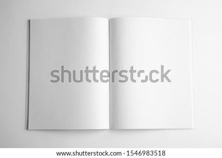 Blank open book on white background, top view. Mock up for design