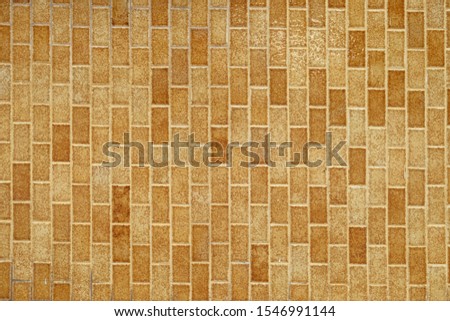 The wall is made of tiles, used for the background.