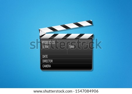 Movie clapper board on blue background