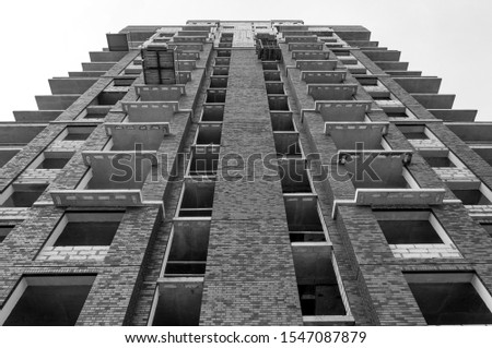 Top view of a high-rise apartment building. Black and white. New construction