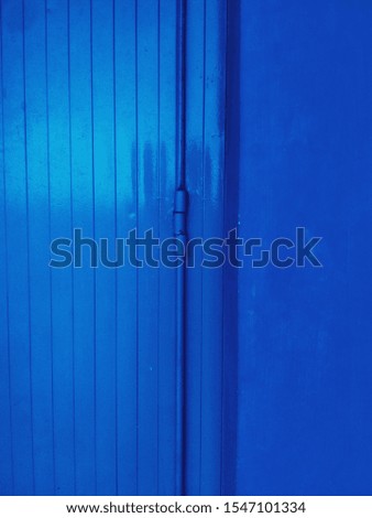 blue background, iron texture, wall