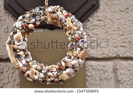 A wreath made of shells