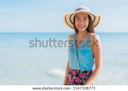 Portrait beautiful young asian woman happy smile relax around beach ocean and sea for leisure travel and vacation