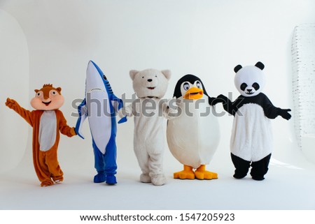 Group of mascots doing party. Concept about carnival, animals rights and lifestyle Royalty-Free Stock Photo #1547205923