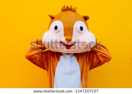 Squirrel character mascot has a message for humanity. Environmental concept about animal rights Royalty-Free Stock Photo #1547207537