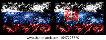 Russia, Russian vs Slovakia, Slovakian New Year celebration sparkling fireworks flags concept background. Combination of two states flags.
