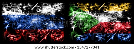 Russia, Russian vs Comoros, Comorian New Year celebration sparkling fireworks flags concept background. Combination of two states flags.
