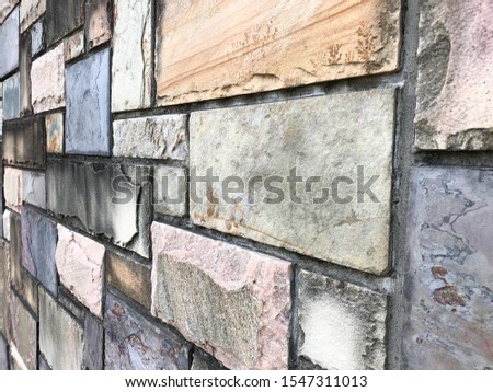 Sand wall pattern texture, Stone background made of old bricks and antique stones.