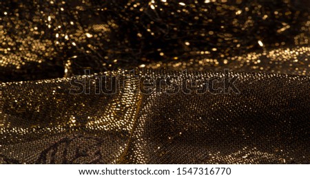 texture, background, pattern, lace with gold sequins Elastic lace pattern from gold strings with lace trim - a wonderful dark gray color with a pink pattern!