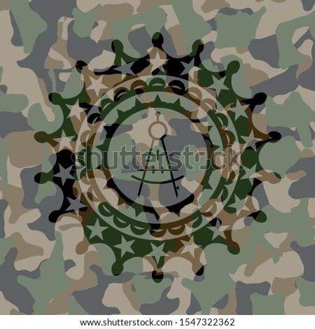 drawing compass icon on camouflage texture